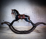Unusual Vintage Glossy Black Wooden Rocking Horse On Bow Rocker. - Harrington Antiques