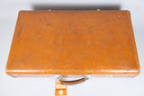 Vintage 1960s Revelation Tan Leather Suitcase With Travel Labels. - Harrington Antiques