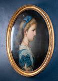 19th Century Oval Portrait Of A Girl In Blue. Oil on Canvas. - Harrington Antiques