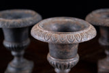 Three Miniature Cast Iron Urns