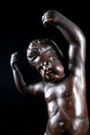 19th Century Ebonised Carved Putto