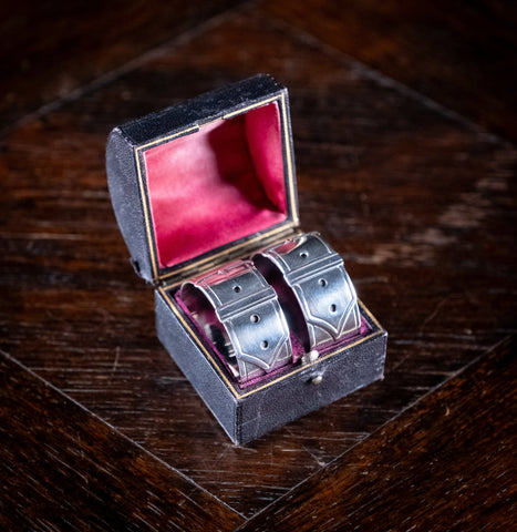 Cased Pair Silver Belt Buckle Napkin Rings by James Dixon & Sons, 1894. - Harrington Antiques