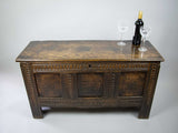 17th Century Oak Plank Coffer With Carved Triple Panel Front. - Harrington Antiques