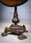 19th Century Cast Iron Tilt Table With Later Flame Mahogany Top. - Harrington Antiques