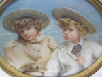 Early 20th Century Framed Pair Of Miniatures Depicting Three Children In Edwardian Dress. - Harrington Antiques