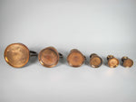 Six Graduated Vintage Copper Imperial Measuring Jugs. - Harrington Antiques