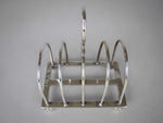 Sterling Silver Five Bar Toast Rack by William Hutton & Sons, Sheffield, 1907. - Harrington Antiques