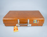 Vintage 1960s Revelation Tan Leather Suitcase With Travel Labels. - Harrington Antiques